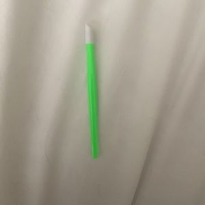 Neon green cuticle pusher